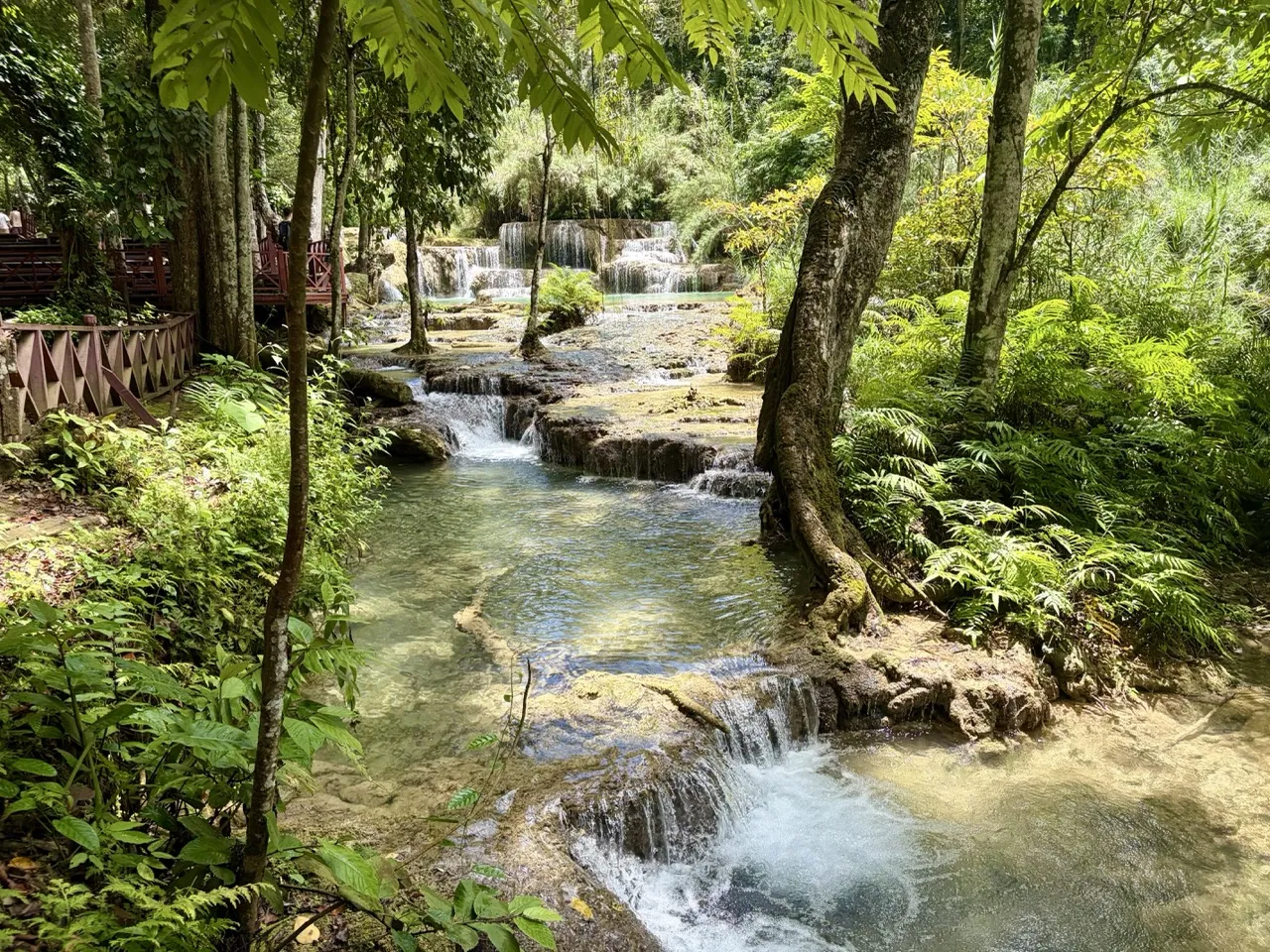 Hiking up alongside Kuang Si Falls