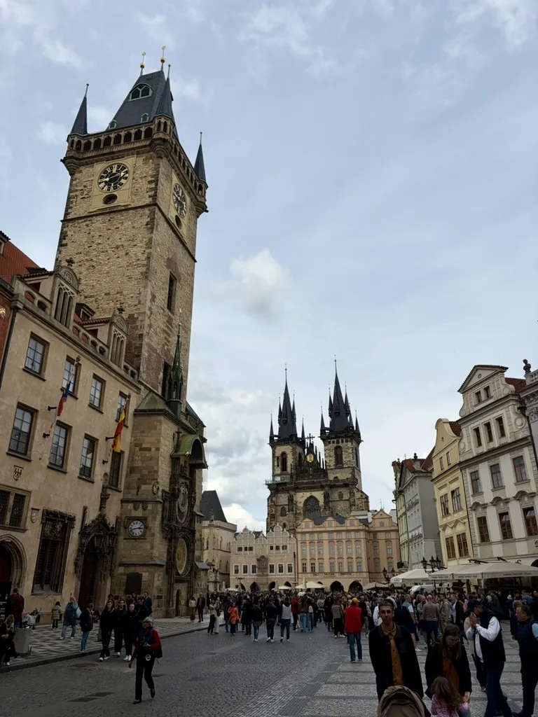 Old Town Square, with the clock tower and Týn Church behind it