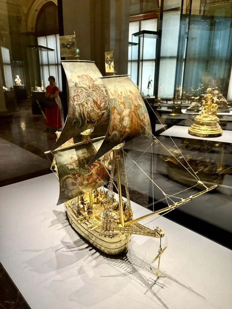 A mechanical miniature galleon, cannons and all